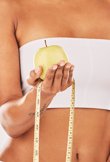 healthy tape measure and body with black woman nuremedy wellness